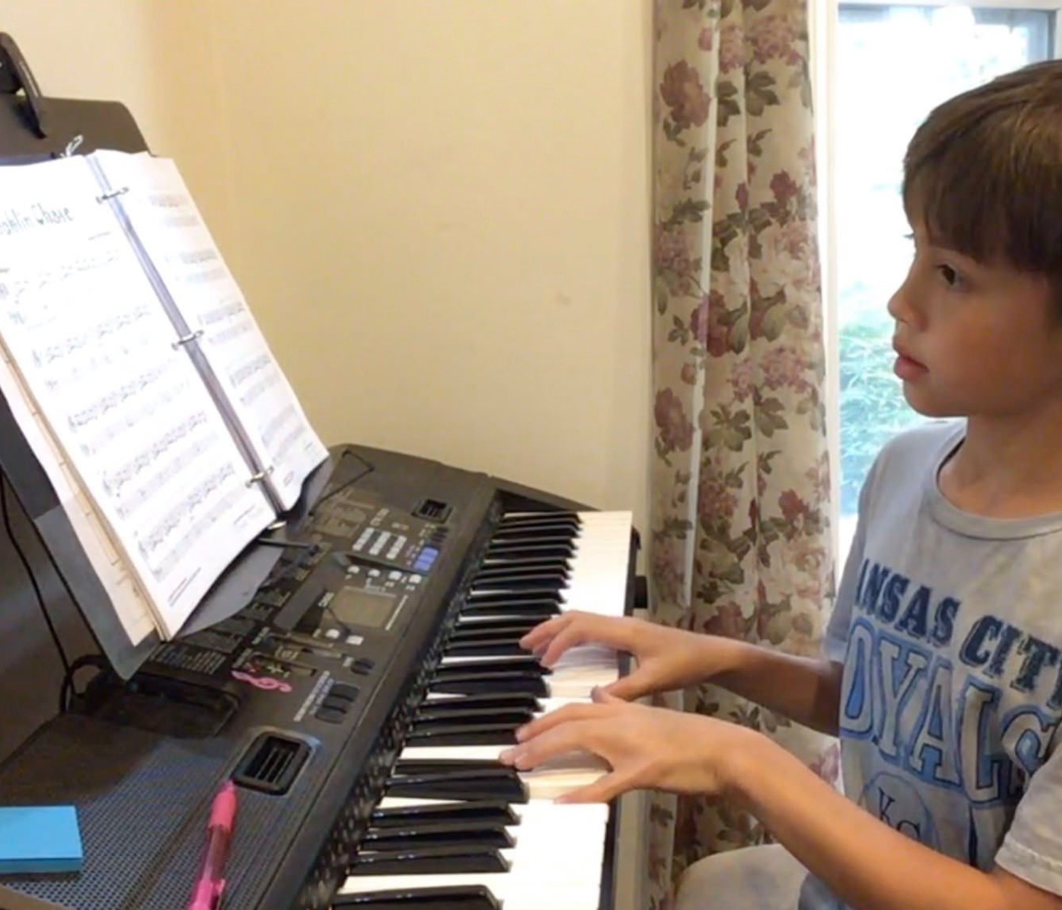Student taking an online piano lesson from home with Keys 4 Life Piano Studio